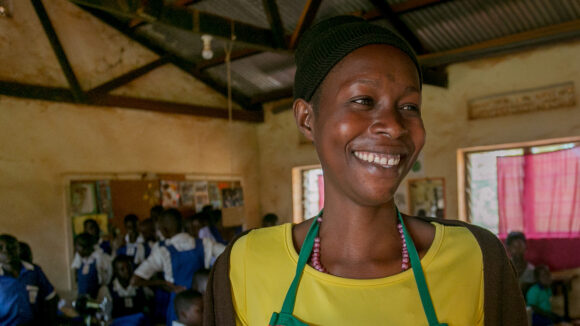 Sylvia smiles in her classroom.